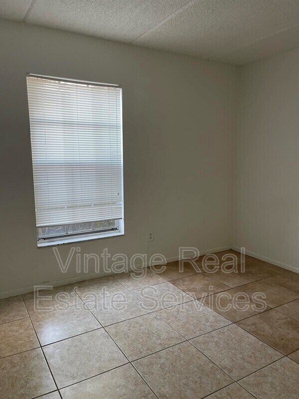 Building Photo - 1303 83rd Ave N