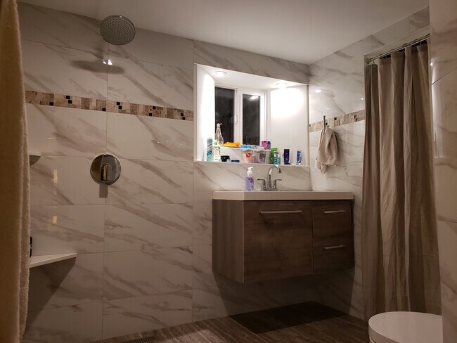 newly installed open shower bathroom - 2811 NW 58th St