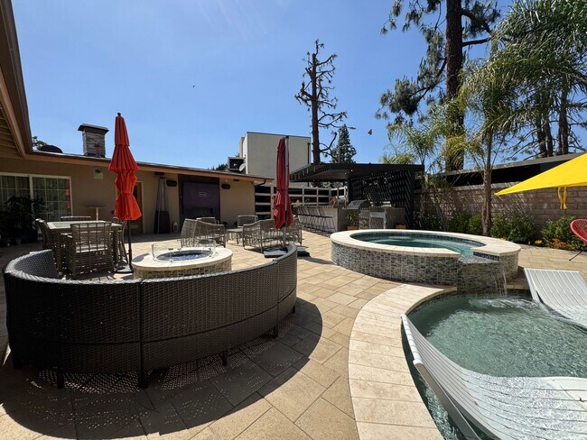Building Photo - Luxurious Oasis with Resort-Style Pool and...