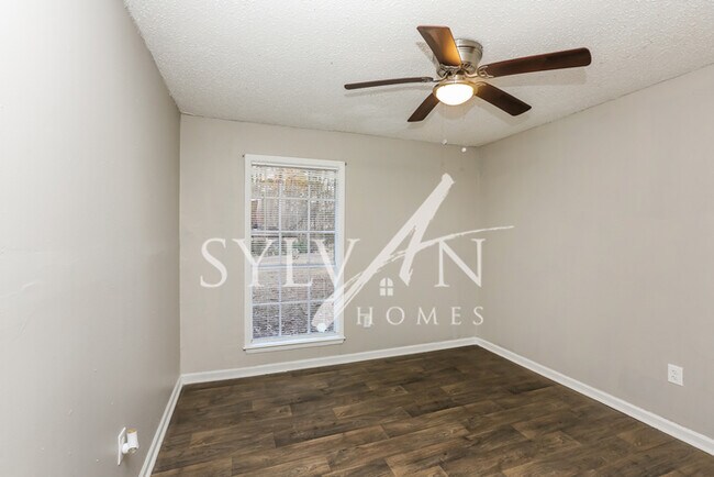 Building Photo - This 4 bedroom, 2 bathroom home is exactly...