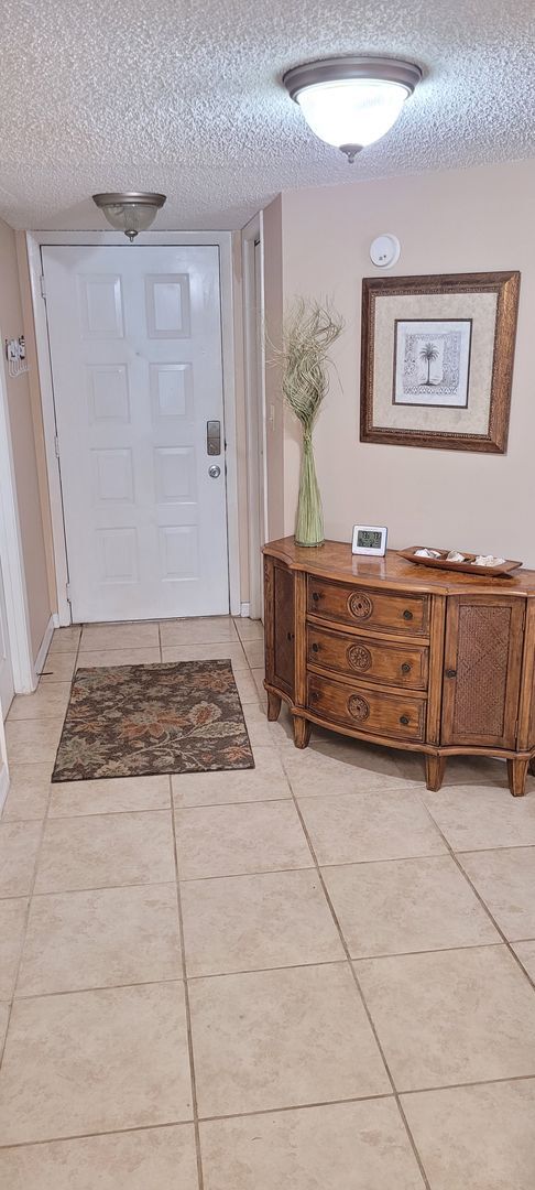 Building Photo - Funished Resort Style Condo in Gated Community- River Front