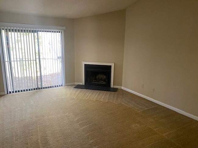 Building Photo - NOW AVAILABLE! Charming 2-Bedroom, 2-Bathroom Single-Level Townhome