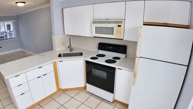 Building Photo - 5290 W 21st Ct