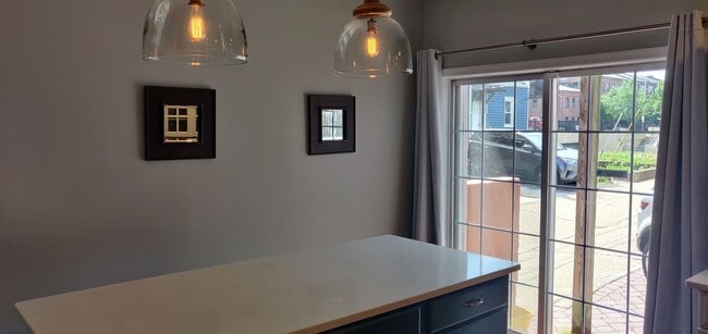 Building Photo - Chamring 2-Bedroom Locust Point Townhome w/ Deck