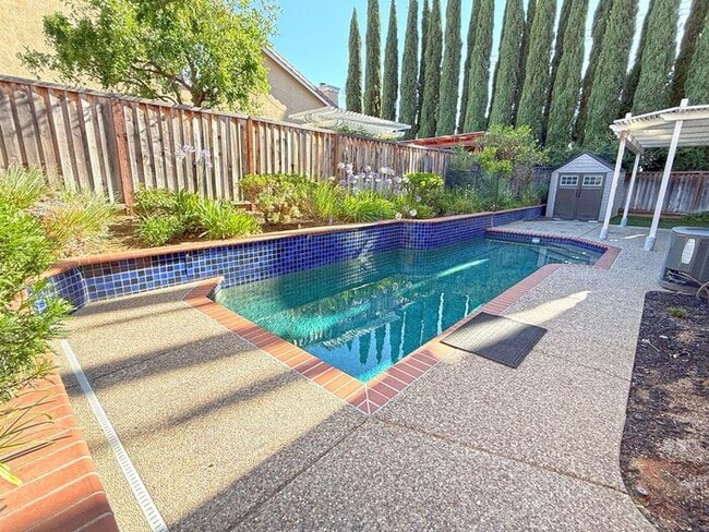 Building Photo - Beautiful Evergreen Home with Pool on Corner Lot -- Walk to Park and Chaboya Middle!