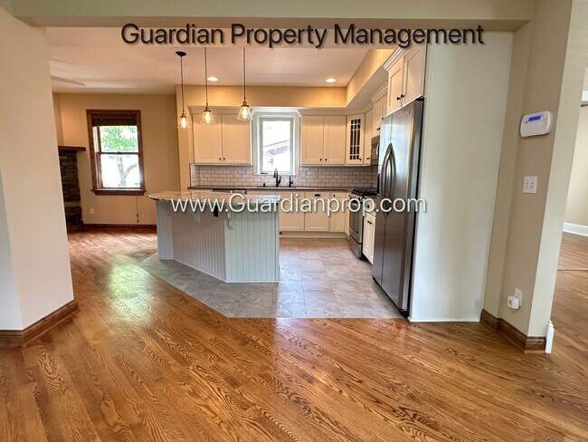 Building Photo - Downtown Hopkins SFH, Fenced Yard, Patio, Spacious Primary, 4 Car Detached Garage