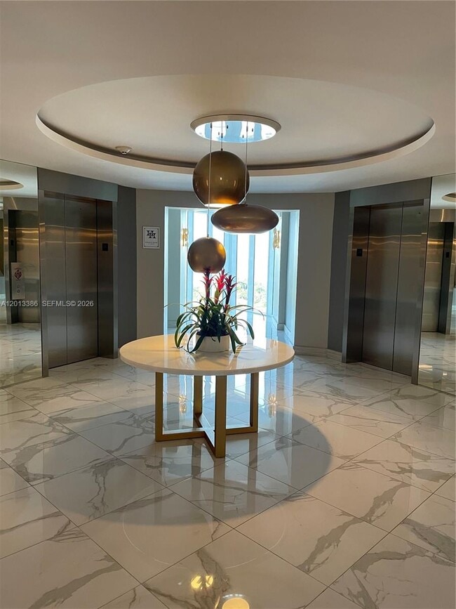 Building Photo - 10275 Collins Ave