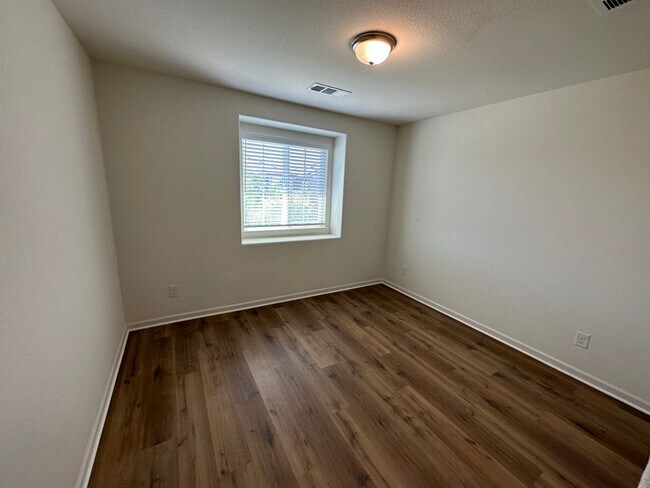 Building Photo - Stunning 4 Bedroom, 3 Bath Gated Community W/ Solar