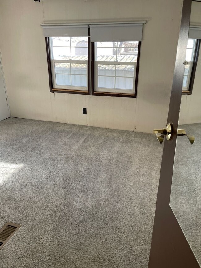 Building Photo - Comfortable 2+ Bedroom Mobile Home with Extra Storage and Enclosed Entries