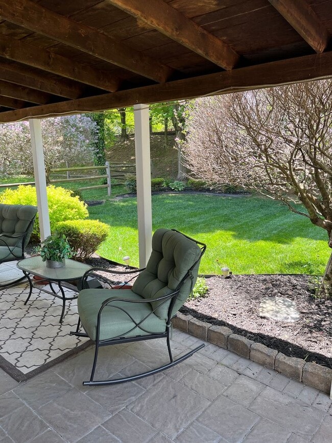 Building Photo - Updated & Landscaped 4 Bedroom, 4 Bath Hom...