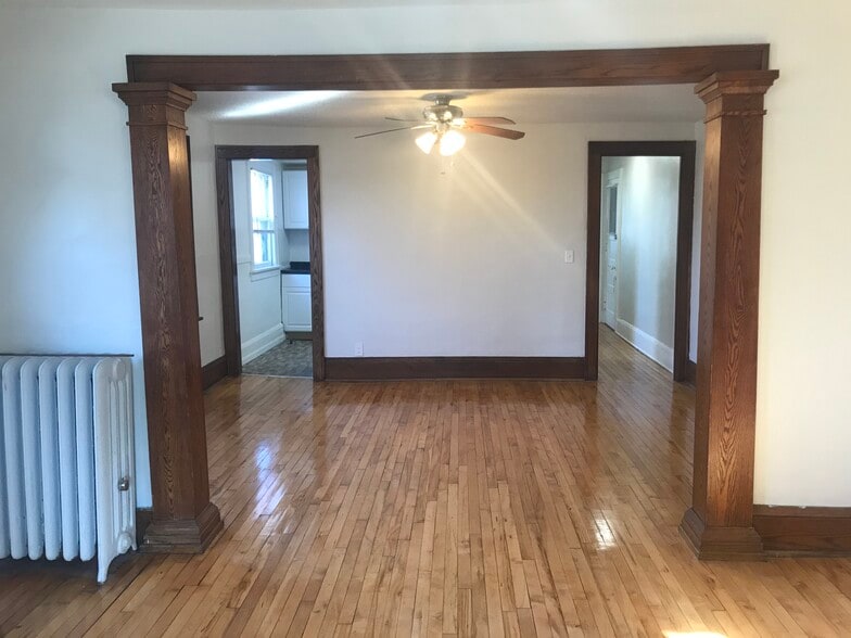 Original woodwork shines in the dining room - 2917 S 31st Ave