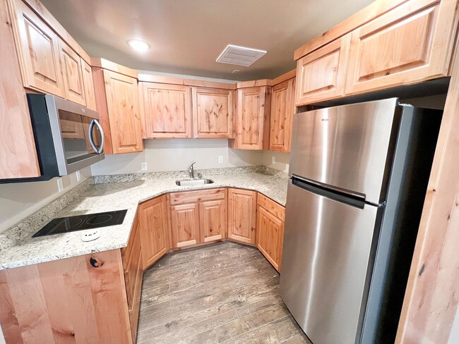 Building Photo - S207 Renovated Studio Apartment! Utilities Included!