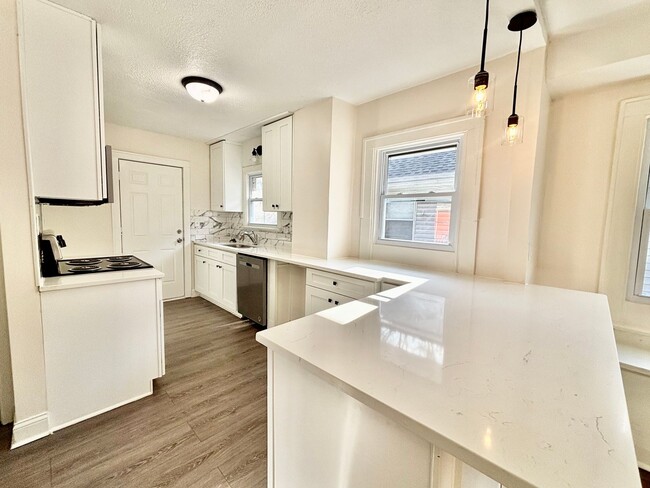 Building Photo - Fully Renovated 2-Bedroom Home with Back Deck, Basement & Off-Street Parking