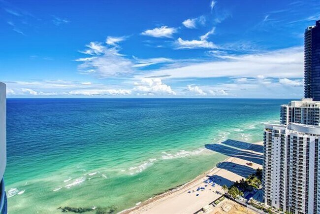 Building Photo - 18911 Collins Ave