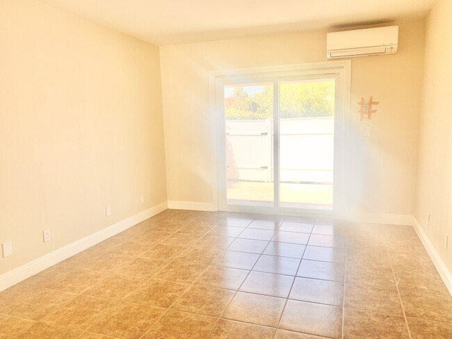 Room with sliding door entry/exit - 7957 5th St