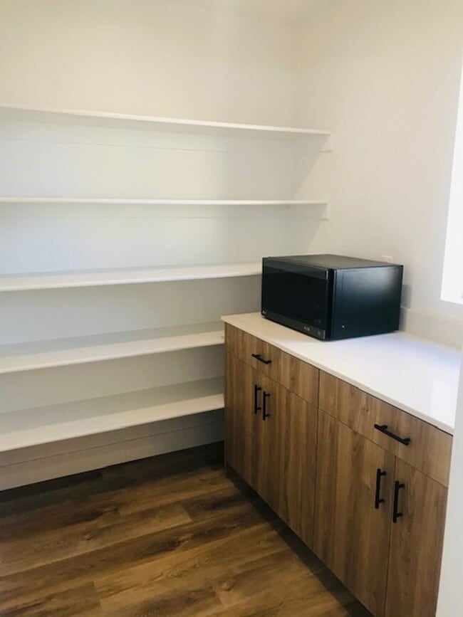 Building Photo - Beautiful new construction townhouse with quartz countertops and 2 car garage