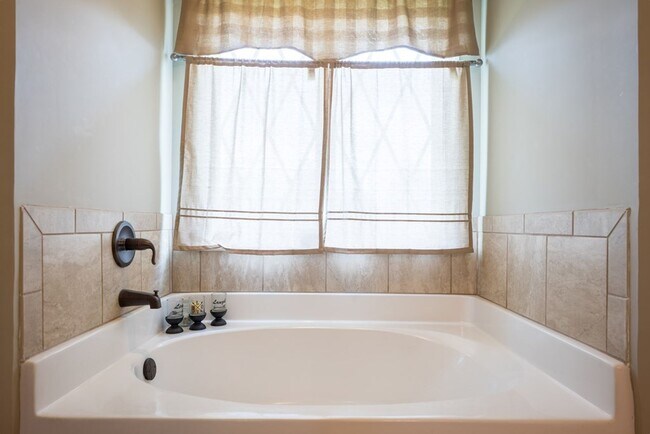 Building Photo - POOL - Elegant 4-Bedroom Home with Fenced Yard