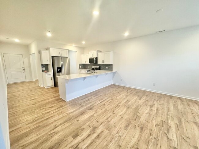 Building Photo - Three bedroom 2 1/2 bath single-family home in the new Kensington community