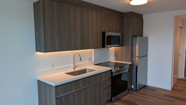 Building Photo - The Park on Keeaumoku brand new studio apa...