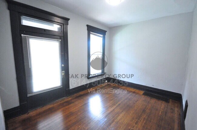 Building Photo - 131 W 8th Ave