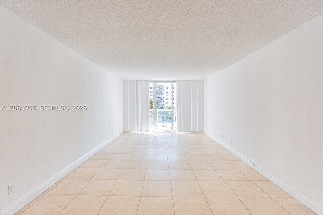 Building Photo - 19380 Collins Ave