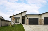 Building Photo - Two Bedroom Twin Villa with 1-Car Garage