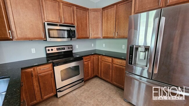 Building Photo - FREE July Rent for this Quiet, Four Bedroo...