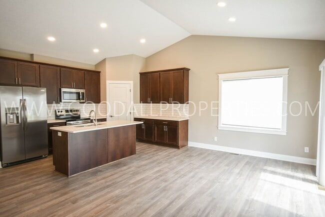 Building Photo - 4-Bedroom Ranch in Clive with Finished Basement & 3-Car Garage!