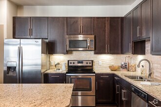 Building Photo - Only $1,314 - MIDTOWN Downtown!!