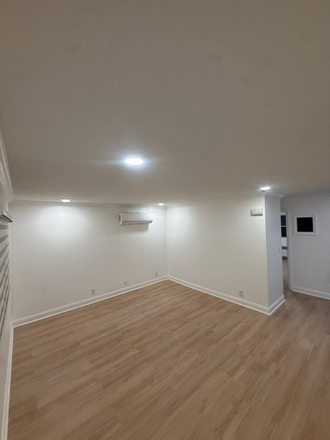 Spacious living room with recessed lighting & mini split heating/cooling - 1120 50th St