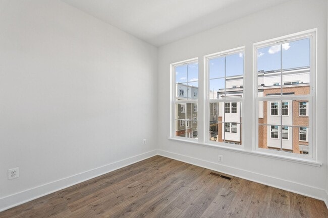 Building Photo - Brand New 4 Bedroom, 3.5 Bath Townhome in ...