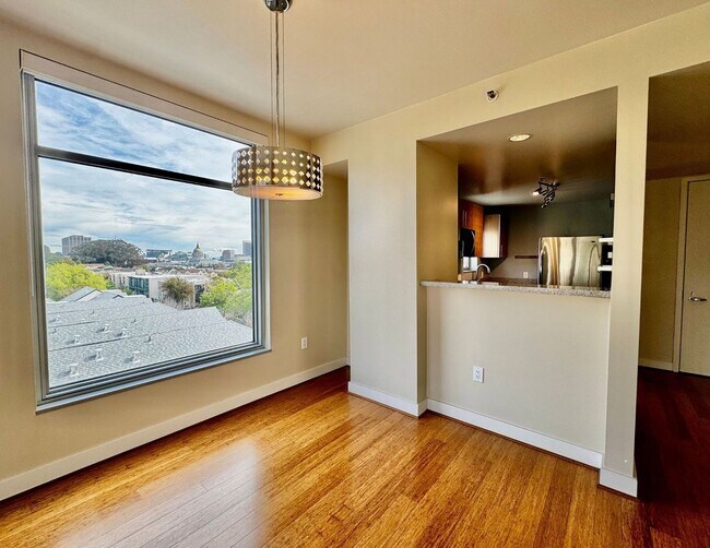 Building Photo - Corner Light. City Energy. Zero Compromise.