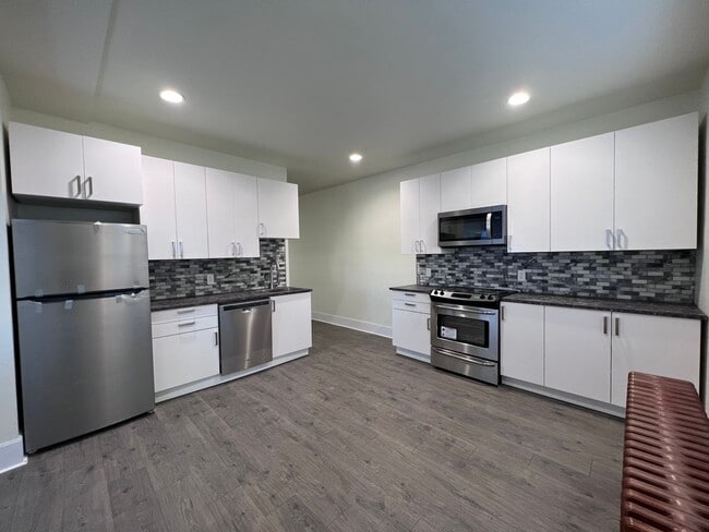 Building Photo - Updated 3 BR 2.5 bath house now available!