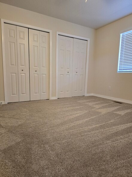 2nd bedroom with double closets - 726 W Tyrolean Ct