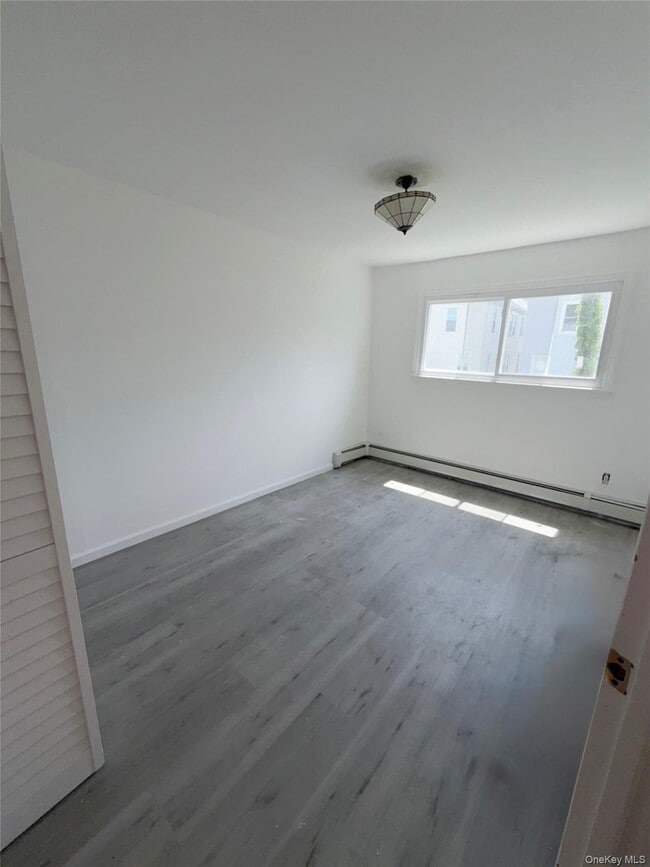 Building Photo - 69-47 Hillmeyer Ave