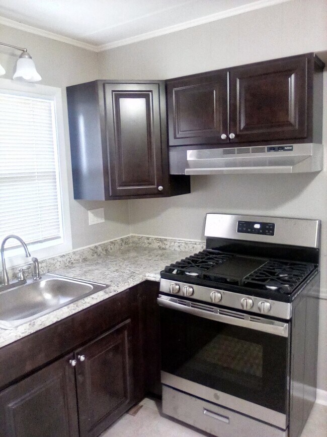 Building Photo - Pine Hill Village - A Great Place to Call Home