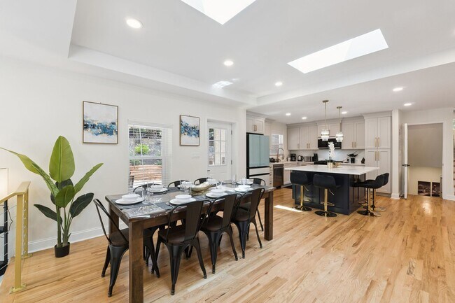 Building Photo - Fully Furnished: Beautiful 4-Bedroom Home ...