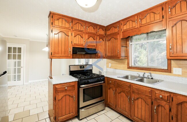 Building Photo - Move in before February 28th and choose your reward: a $250 Amazon Gift Card or a 55" Smart TV!