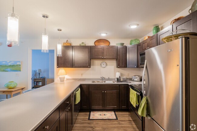 Building Photo - Spacious 1-Bedroom with Den & Premium Amenities at Village at Autumn Pond