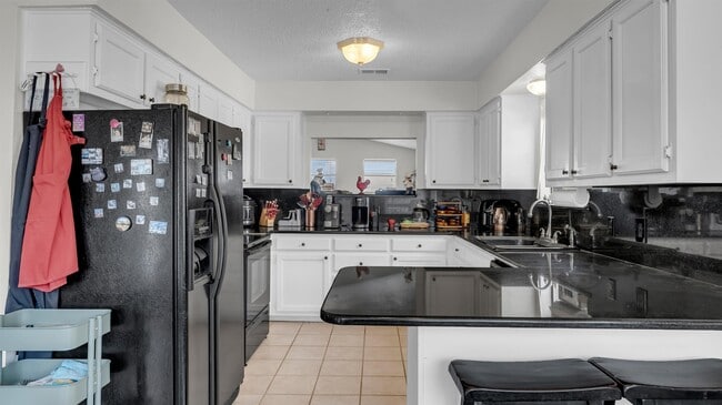 Building Photo - 708 Scarlet Sun