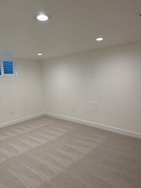 Building Photo - Modern finishes, spacious living, huge fenced backyard