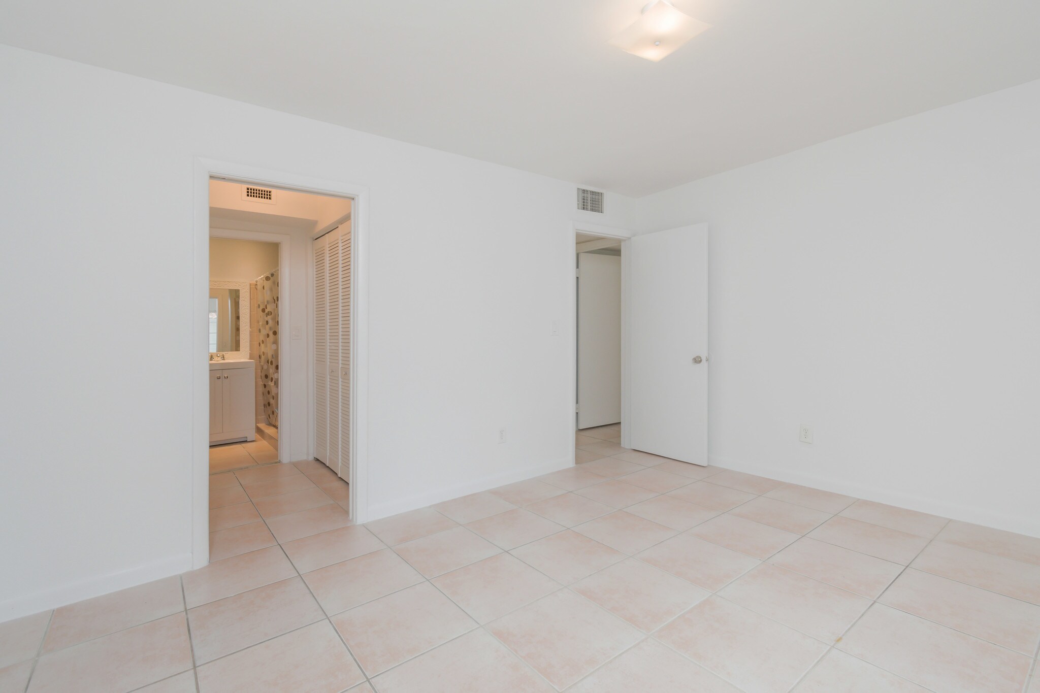 Master Bedroom with His & Hers Closets - 3912 Ponce de Leon Blvd
