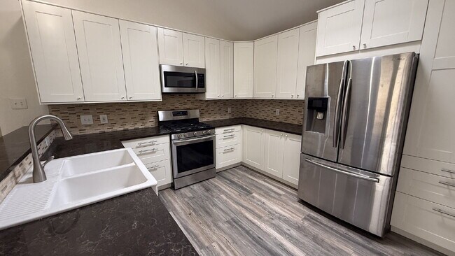 Building Photo - Updated 4-Bedroom 2 Bathroom Austin Home with Beautiful Backyard