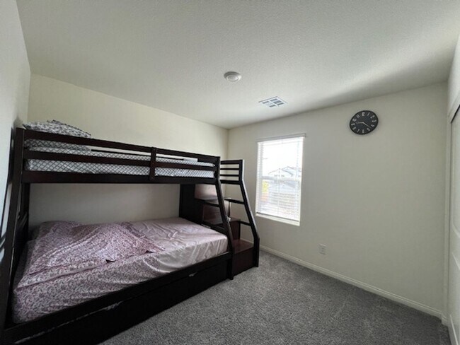 Building Photo - FULLY FURNISHED!!! beautiful 3 bedroom 2 and half bath home is located in the Symmetry Bay Cadenc...