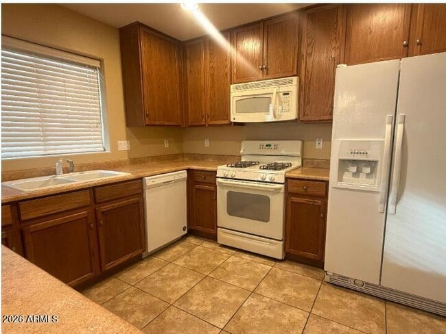 Building Photo - 12807 W Desert Mirage Dr