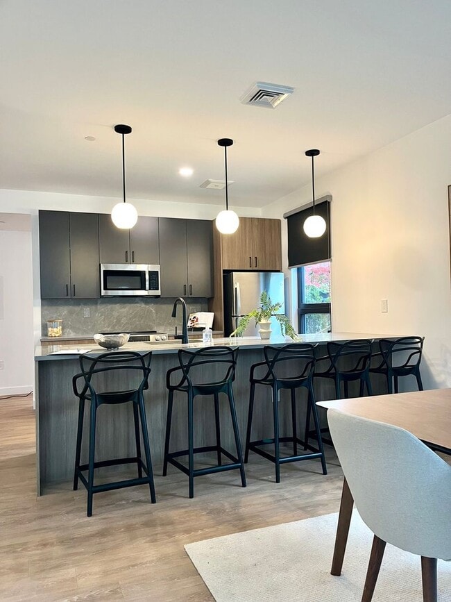 Building Photo - MODERN New building with garage parking