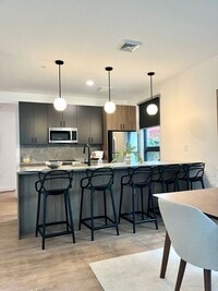 Building Photo - MODERN New building with garage parking