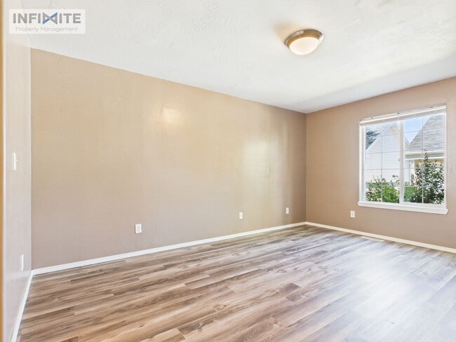Building Photo - 2 Bedroom | 2 Bathroom Condo Single-Level Lower-Level Living