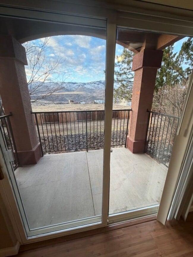 Building Photo - Discover Your Dream Condo with Stunning Mountain Views a 1 Car Garage & Covered carport in NW Ren...