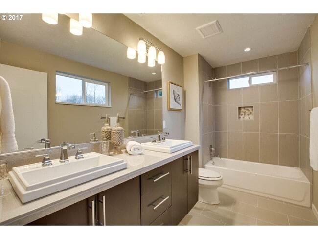 Building Photo - Charming 3BR Home with Fireplace, Bright Open Living Spaces & Loft